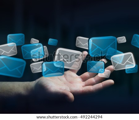 Businessman holding digital email icons in his hand 3D rendering
