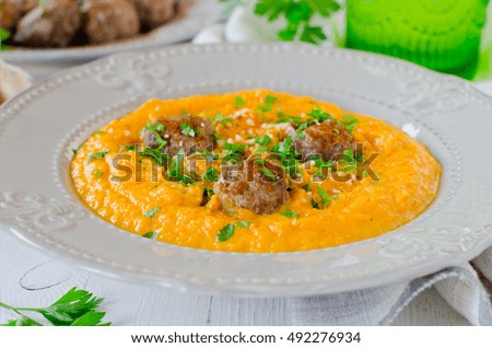 Carrot cream soup with meatballs