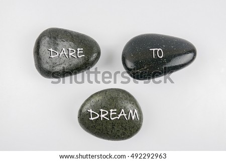 Dare to dream, three words motivational slogan conceptual