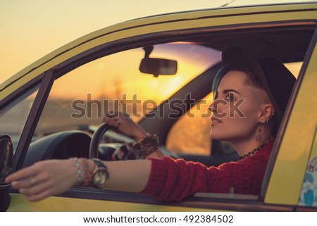 Creative person portrait in car