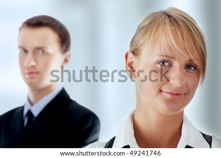 Young attractive business people isolated