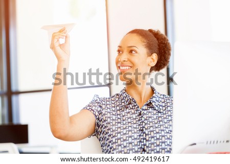 Portrait of smiling afro-american office worker in offfice