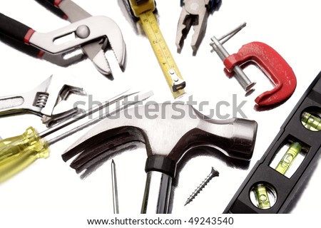 Assortment of tools close-up on white Royalty-Free Stock Photo #49243540