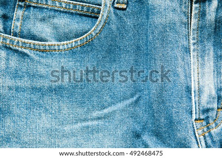 Texture old blue jean front with seam and crotch of trouser
