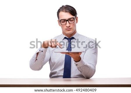 Handsome businessman working with tablet computer isolated on wh