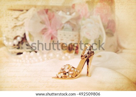 Vintage golden slipper. Wedding background