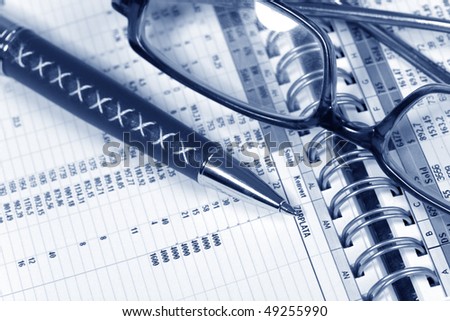 Financial concept. Calculator and pen.