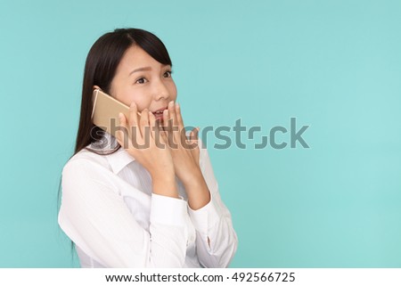 Woman who is talking on a smart phone