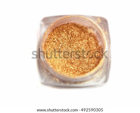 Gold glitter, shiny eyeshadows. Brilliant glitter nail design on a white background, horizontal