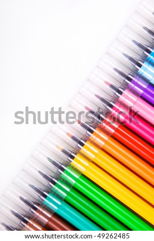 multicolored markers on white