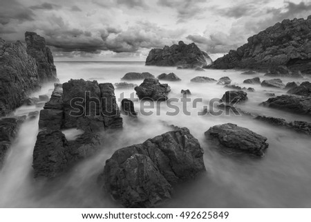 Beautiful Seascape, Ocean and Rocks Black and White Image.