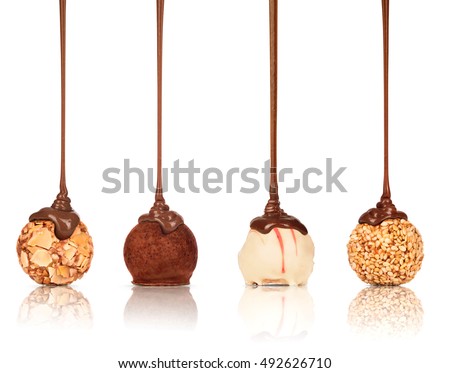 Set of sweets poured melted chocolate on a white background Royalty-Free Stock Photo #492626710