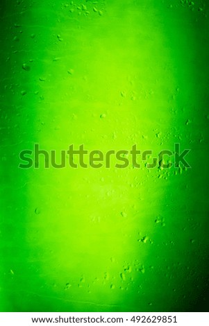 drops of water on glass with green background in macro lens shot small-DOF for screen wallpapers