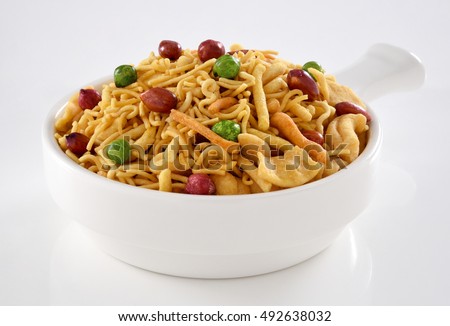Fresh and crunchy Nimco Mix, delicious blend of sev, peanuts, chick peas and fried lentil. Royalty-Free Stock Photo #492638032