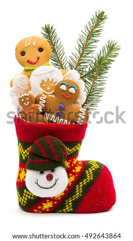 Christmas cookies in a sock isolated on white background
