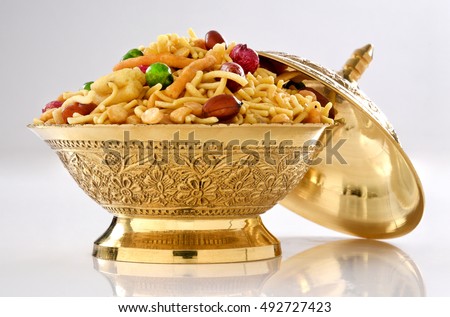 Delicious and crunchy Mix Nimco in golden antique bowl Royalty-Free Stock Photo #492727423