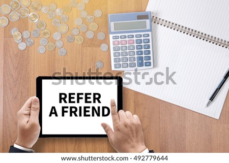 REFER A FRIEND A finance Money, calculator notes, calculator top view  work