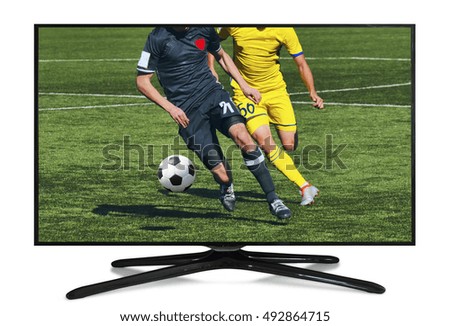  watching smart tv translation of football game.