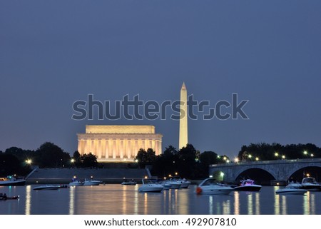 Lincoln Memorial and Washington Monument seen across the Potomac river in Washington, DC, USA.