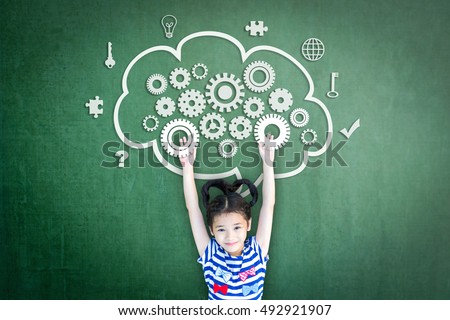 School girl kid student with cloud computing mind, smart brain imagination doodle on chalkboard for science technology education, children psychology and mental health awareness concept Royalty-Free Stock Photo #492921907