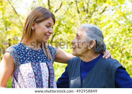 Picture of a beautiful young woman with her grandmother