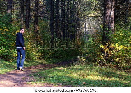 Man in forest. Man on trail. Human