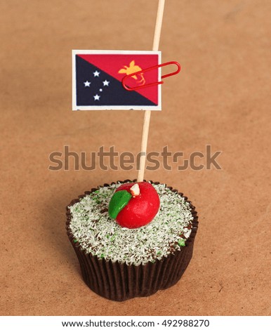 Papua New Guinea flag on a apple cupcake,picture of a