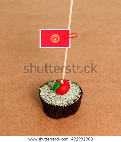 Rwanda flag on a apple cupcake,picture of a