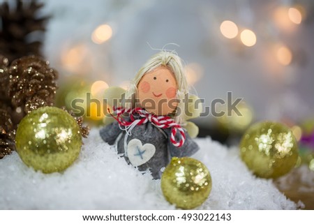 Christmas Angel with snow and christmas balls