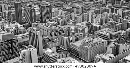 Johannesburg, South Africa - December 21, 2013: Johannesburg Central Business District has the most dense collection of skyscrapers in Africa. The air view of Johannesburg. Old photo. Retro. Vintage 