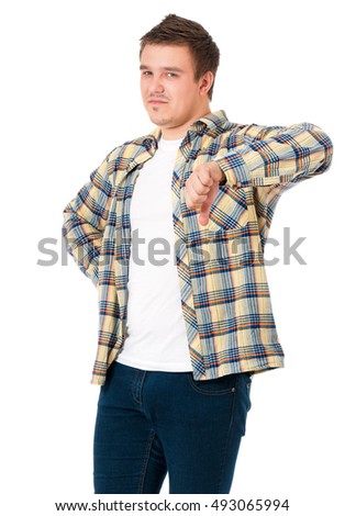 Young casual man show the thumb down negative hand sign, isolated on white background. Disappointed handsome guy making bad sign and making sad a face. 