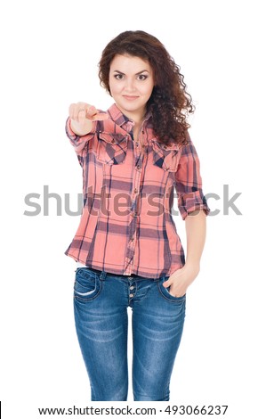 Happy smiling young woman or teenage girl pointing finger to you. Teen girl pointing at camera choosing you, isolated on white background. Portrait of beautiful female - gesture and people concept.