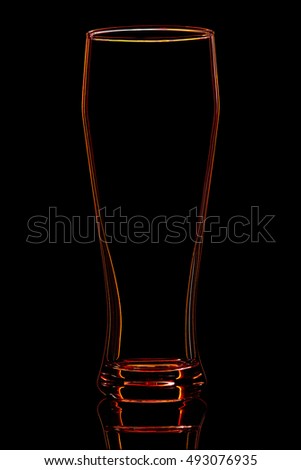Silhouette of red beer glass with clipping path on black background.