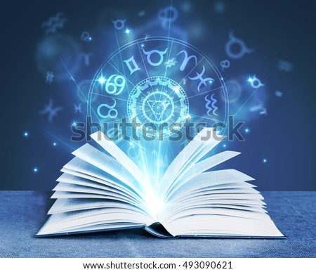 astrology magic book Royalty-Free Stock Photo #493090621