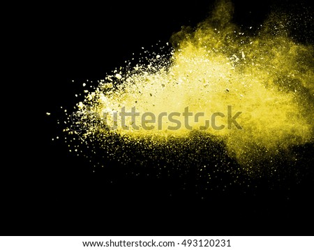 abstract powder splatted background,Freeze motion of yellow powder exploding/throwing yellow powder