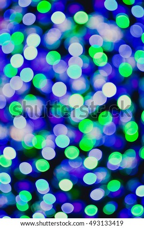 Abstract Christmas background. Blurred lights. Abstract color background.