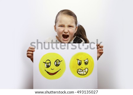 development of emotional intelligence. girl poses faces. It shows different emotions and expressions on the face