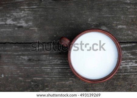 milk cup on wooden, morning milk