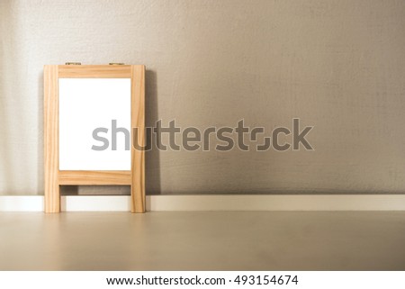 Decorating shelf with small wooden signboard. Warm tone 