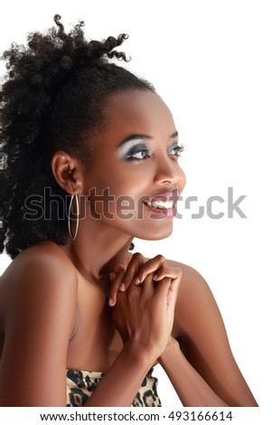 beautiful african woman looking outside the picture with a happy smile