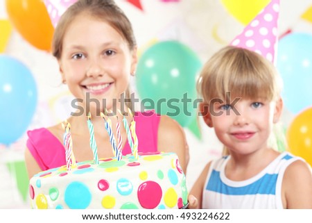 Happy childrens having fun at birthday party