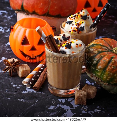Halloween pumpkin spice latte. Selective focus, square image