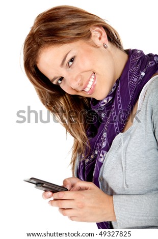 Happy woman texting on her phone isolated over a white background