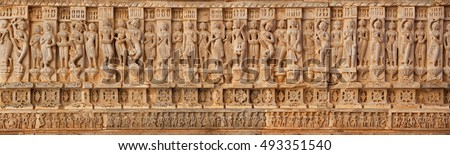 Udaipur, India - Carving on the walls of an ancient temple (Hindu) Royalty-Free Stock Photo #493351540