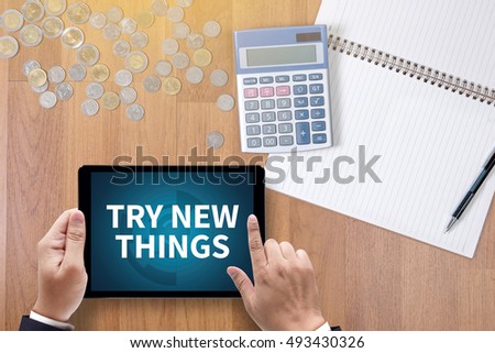 TRY NEW THINGS A finance Money, calculator notes, calculator top view  work