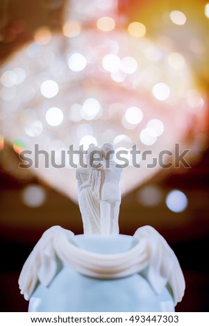 Bridal doll set on a wedding cake.