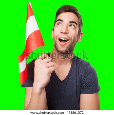 young man holding a flag