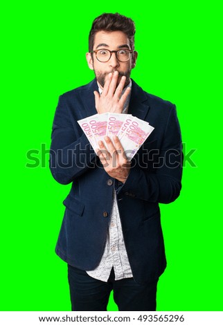 young man holding bills