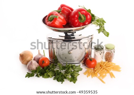 Fresh vegetables with kitchen scales - still life Royalty-Free Stock Photo #49359535