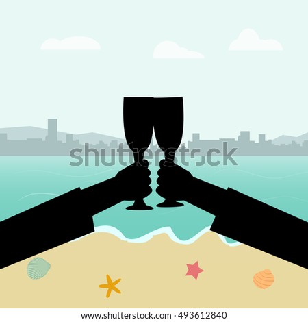 Hands holding glass of wine on beach background